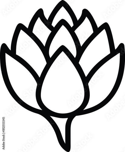 A person wearing a black hoodie and jeans stands in a dimly lit room