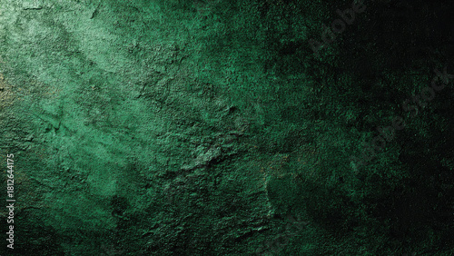 A dramatic dark green textured background featuring a rough, grungy surface, illuminated by a gradient light highlighting its raw, earthy details.