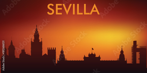 Silhouette of the panorama of Seville, Spain, at sunset with a characteristic orange-red gradient of the sky.