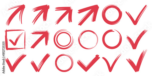 Red brush stroke arrows circles and check marks on a white background in a flat lay arrangement