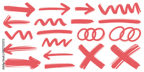 A collection of red hand drawn arrows lines squiggles and crosses on a white background for design use