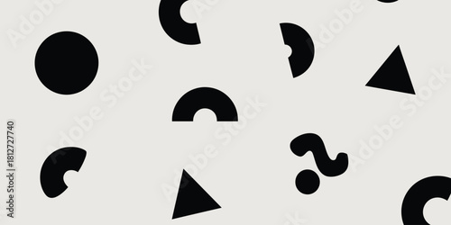 Monochrome background with geometric shapes scattered randomly across the surface in a simple pattern