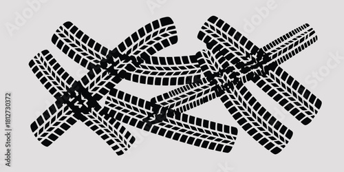A set of overlapping black tire track patterns on a white background creating a dynamic composition effect