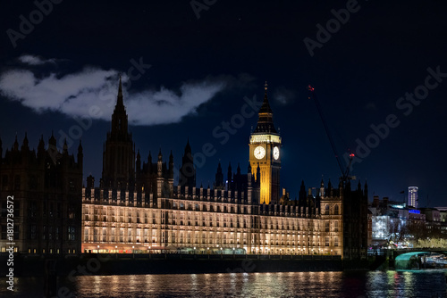 Big Ben and the Houses of Parliament illuminated at night.