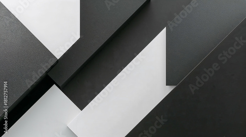 Abstract geometric composition of black and white planes, creating a modern, minimalist, and dynamic visual effect.
