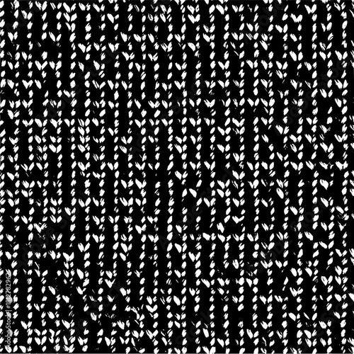 Distressed black and white pattern featuring vertical rows of textured leaf like shapes creating a fabric effect