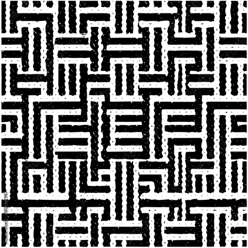 Abstract black and white maze pattern with rough edges and geometric shapes creating a complex design