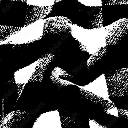 Abstract monochrome image featuring a high contrast pattern of textured shapes and forms in black and white