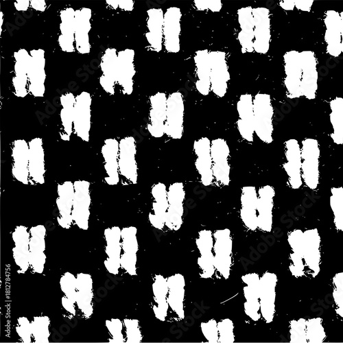 Abstract black and white pattern featuring textured brush stroke like shapes in a grid arrangement