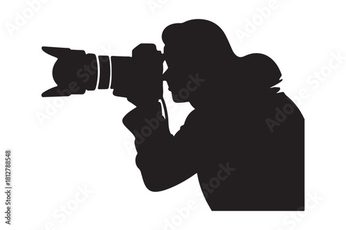 Silhouette of a photographer capturing a moment with a professional camera