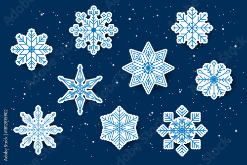 A set of clean white winter snowflake stickers on a deep blue background. Minimal frosty shapes, isolated vector designs perfect for printable stickers, decals, planners, scrapbooking and holiday proj