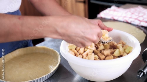 Woman chef prepare apple pie mix filling in kitchen – Homemade baking, holiday dessert, gluten free lifestyle concept