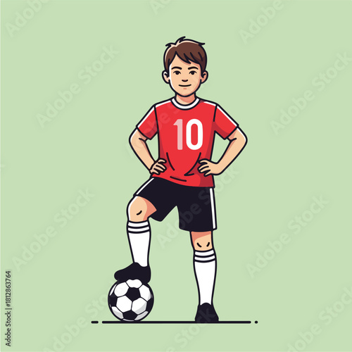 Young Boy Soccer Player Standing with Foot on Ball.
