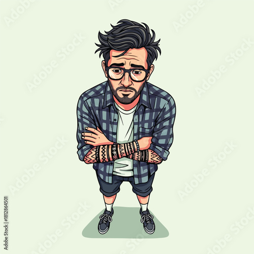 Young man with glasses and tattoos looking up.