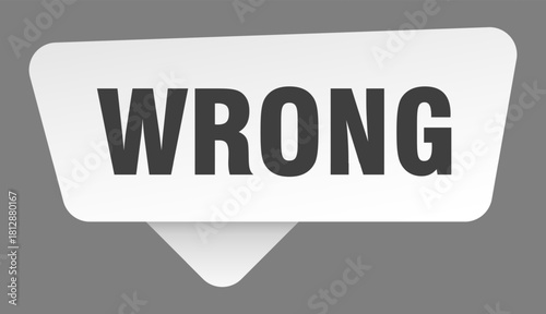 wrong sign. wrong white sticker isolated on gray background
