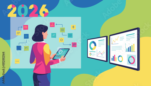 Businesswoman analyzing data screens and workflow for 2026 strategic planning