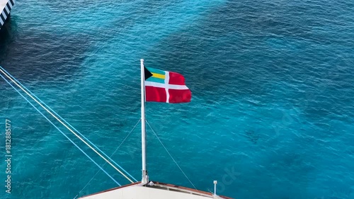 Bahamas Courtesy Flag, Maritime Flag. Flying from the front of a cruise ship. Red ensign.