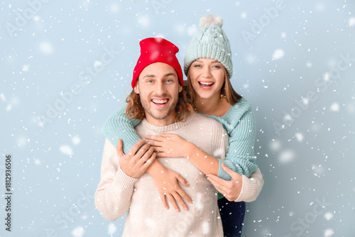 Happy couple in winter clot...