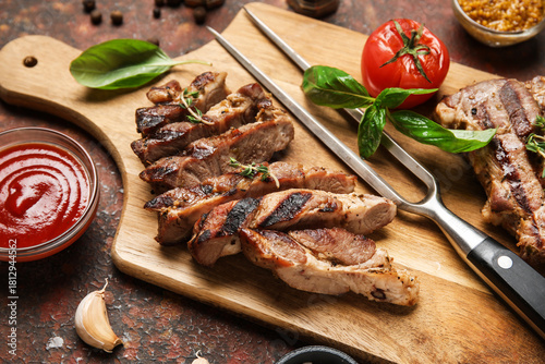 Tasty grilled steaks with t...
