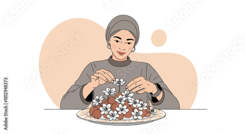 A Woman Embellishes Dessert With Flowers For A Festive Arrangement in Beautiful Composition