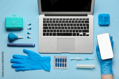 Doctor's hand with mobile p...