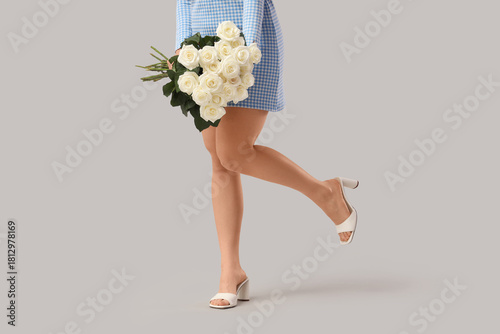 Woman in blue gingham dress...