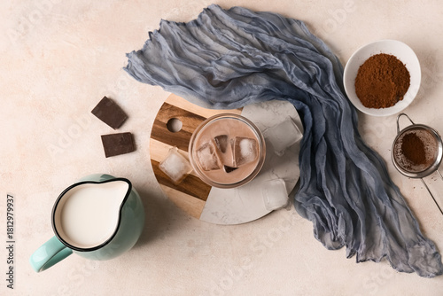 Glass of cold cocoa drink w...