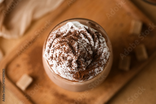 Glass of cocoa drink with w...