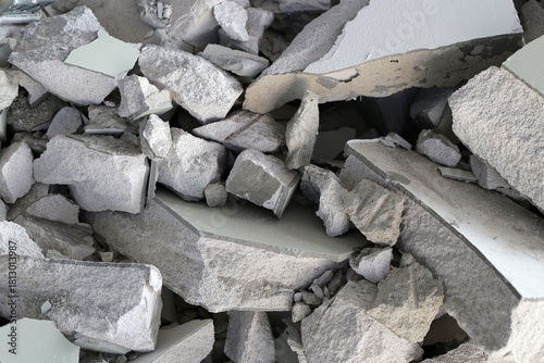 Broken concrete, Piles of lightweight construction bricks after house demolition