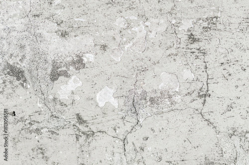 Concrete grunge wall texture with peeling paint and cracks