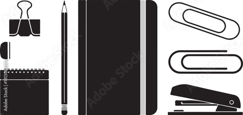 Black and white office supplies arranged on a white background
