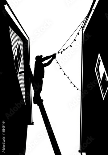 Silhouette of a person on a ladder hanging up festive lights.