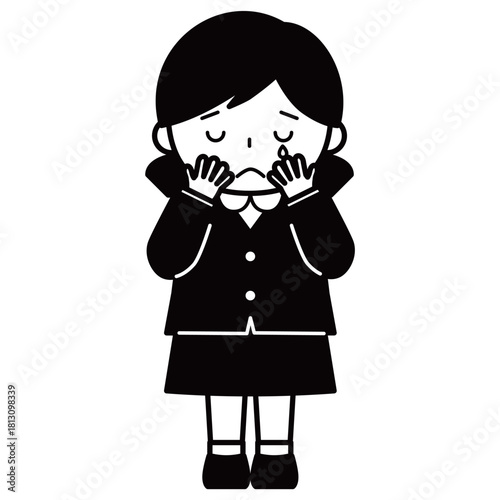 顔を覆って泣いている女の子