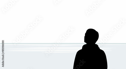 Silhouette of a person looking up with a contemplative expression.