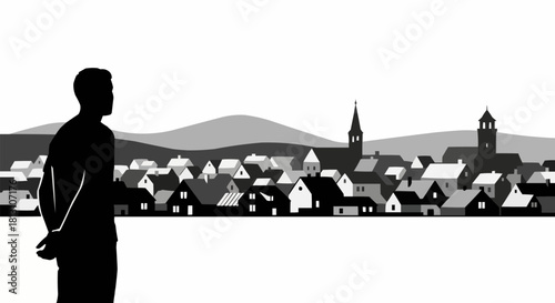 Silhouette of a Man Contemplating a Distant Town.