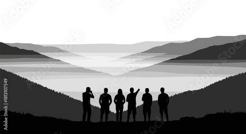 Group of friends silhouetted against a misty mountain landscape.