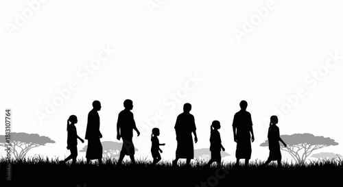 Silhouettes of a family walking together in a savanna landscape.
