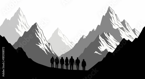 Group of hikers standing on a mountain ridge overlooking a valley.