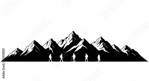Silhouette of a group of hikers trekking before a majestic mountain range.