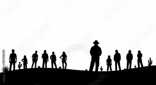 Silhouette of a group of people in the desert with a cowboy in the center.