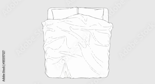 Top view of a neatly made bed with white linens and pillows.