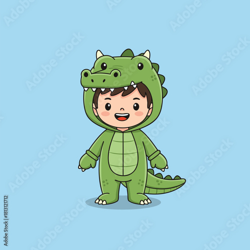 A cute cartoon child with a happy expression wearing a green crocodile costume standing against a light blue background.