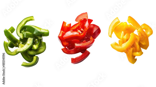 Three piles of sliced bell peppers green red and yellow isolated on transparent background