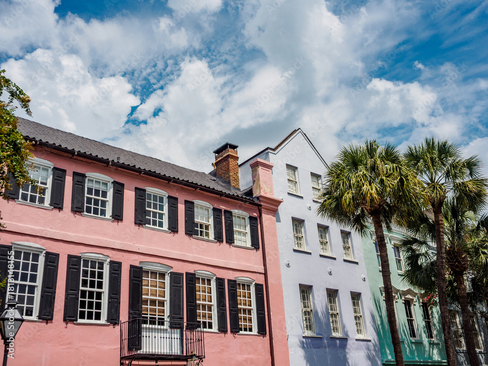 Naklejka premium Colorful southern style homes in Rainbow Row, the historic district of Charleston.