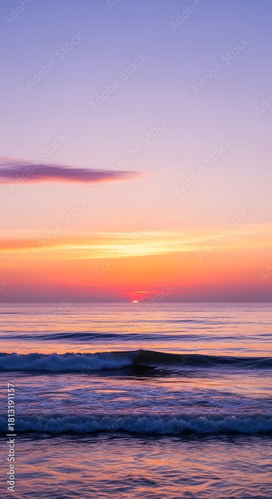 Fototapeta premium Ocean sunset serene scene colorful sky orange light horizon waves