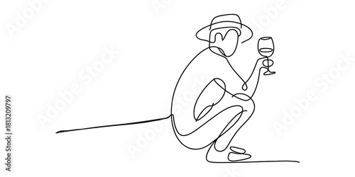 Continuous line art drawing of a person wearing a hat and crouching, holding a glass of wine, an artistic and minimalist illustration.