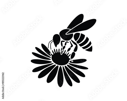 Black silhouette of a bee on a flower