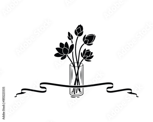 Black silhouette of lotus flowers in glass vase