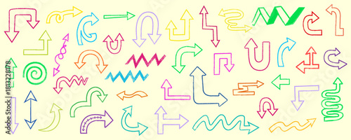 Colorful hand drawn doodle arrow pattern with curves lines and decorative elements seamless design on cream background