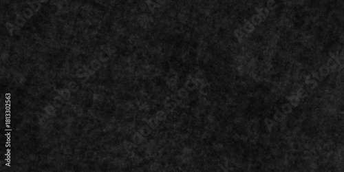 Grunge dark black rough scratch wall concrete charcoal abstract backdrop background. urban distressed cement surface wall backdrop texture background.	